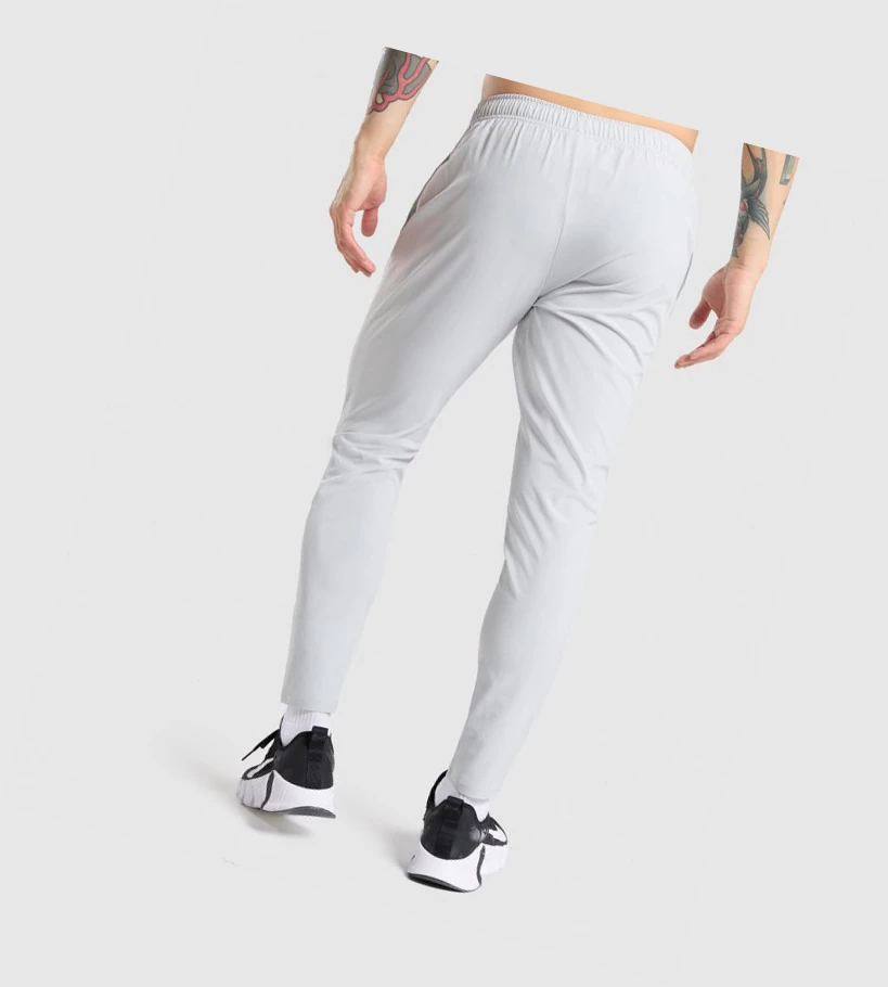 Gymshark Arrival Woven Joggebukser Herre Lyse Grå | TDCQFK497